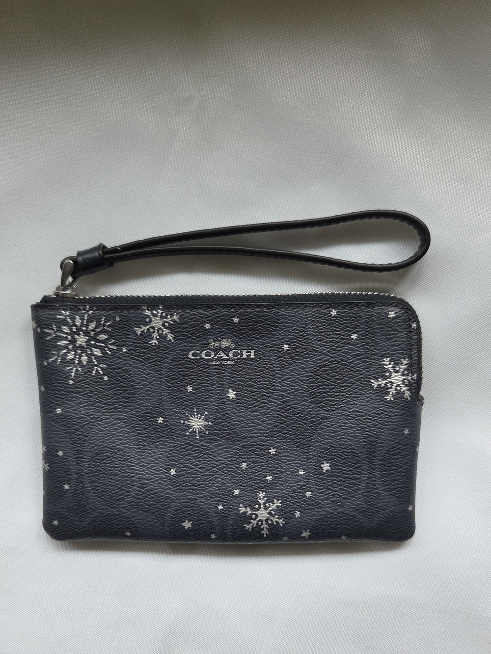 Coach Black Wristlet with Silver Snowflake Motif